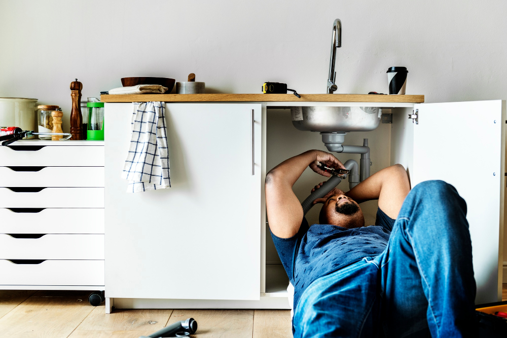 badly blocked drain in Auckland being cleared by plumber
